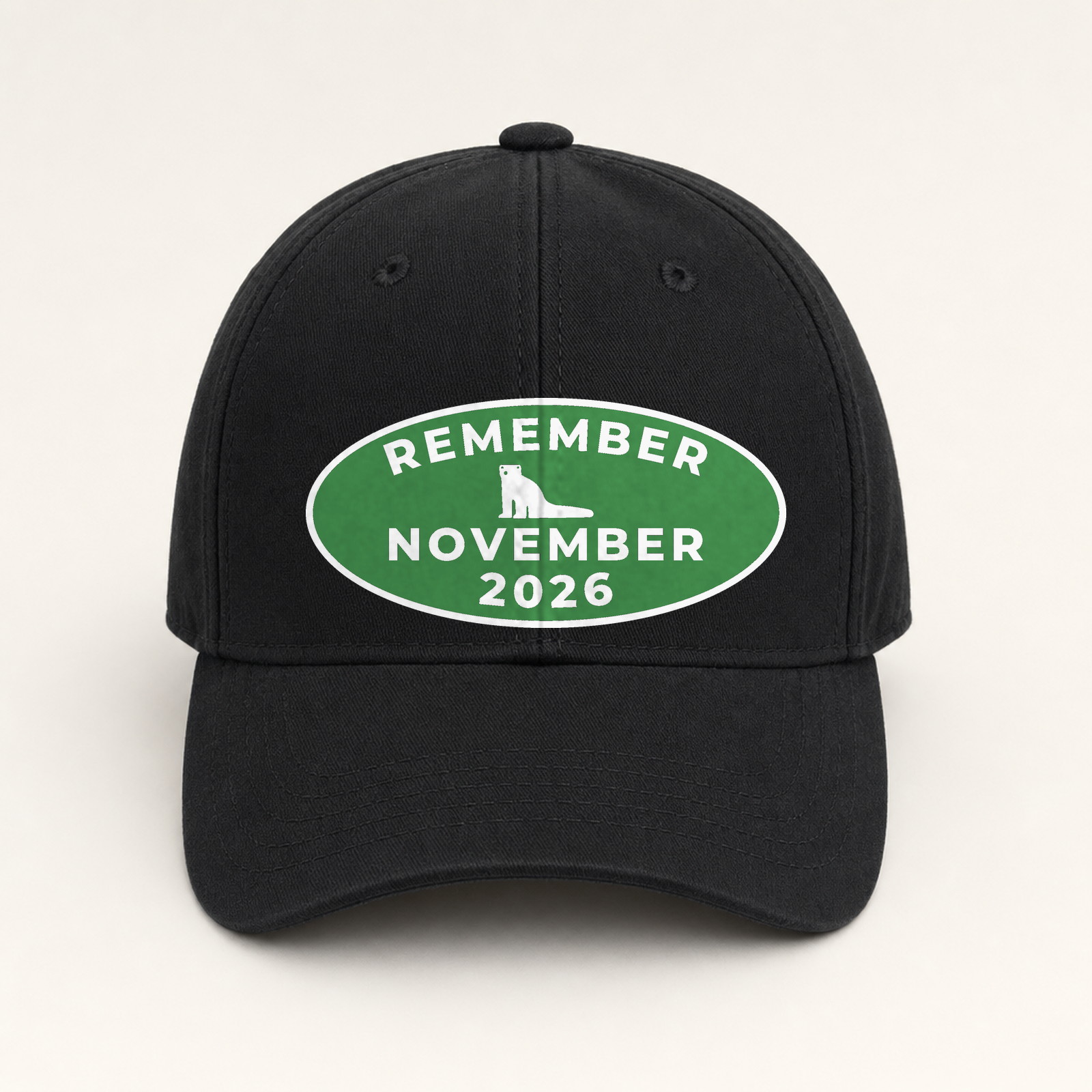 Black dad hat with an embroidered oval November 2026 badge